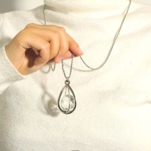 Rhinestone caged pendant necklace
